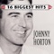 I Got a Hole In My Pirogue - Johnny Horton lyrics