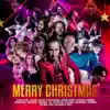 Merry Christmas - Single (feat. Christina Zurbrügg, Paul Raci, Charu Suri, Diana Hopeson, Meryem, Nina Ximenes, Eileen Chai, Dona Maria, Lorena Baricalla, Pierre Baillot, Shin, Greg Poppleton, Thieriki, Eddie Simon, Klaus Vanscheidt, John Heinrich, Chad Melchert & Mark Corradetti) - Single album lyrics, reviews, download